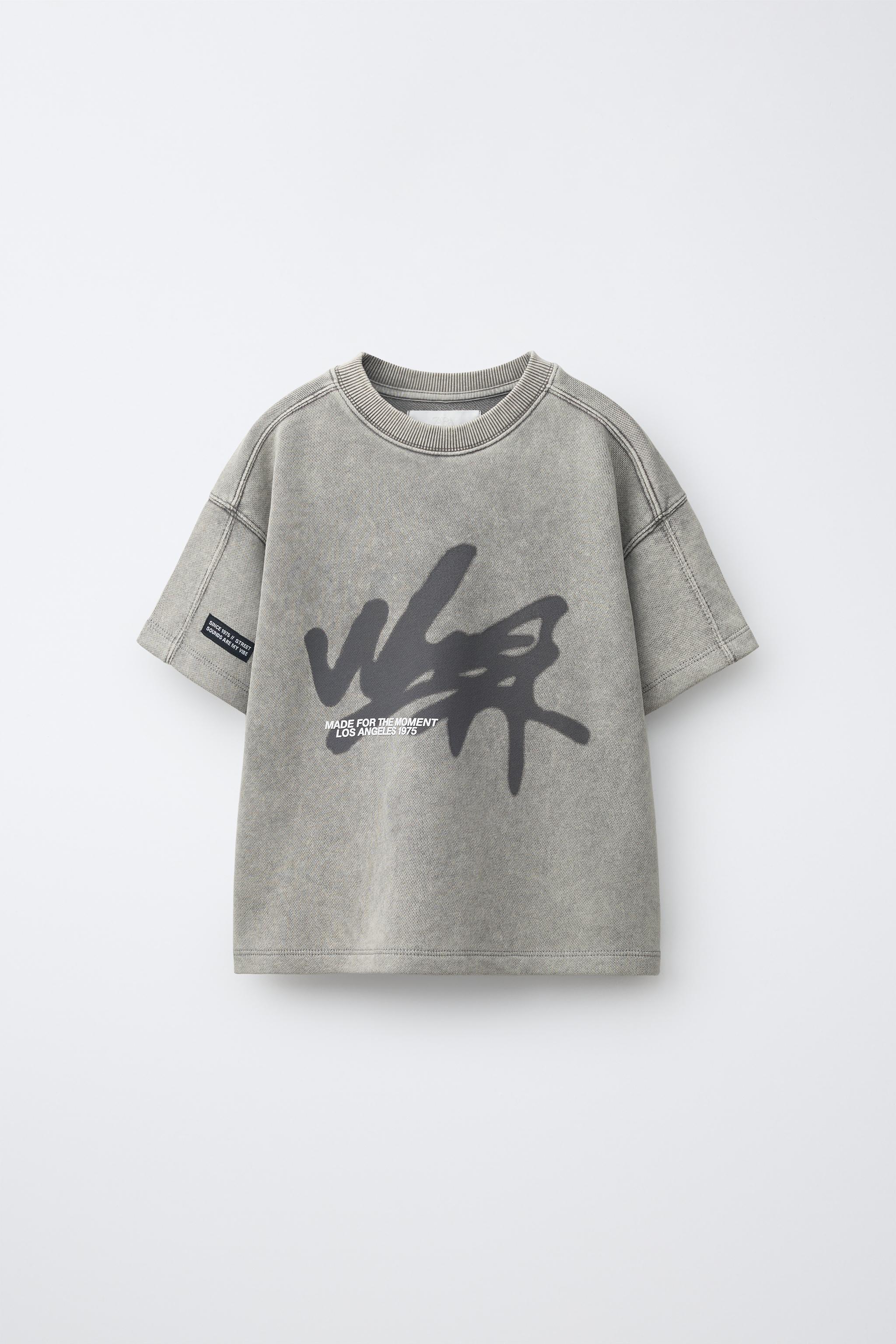 T-SHIRT EFFET DÉLAVÉ GRAFFITI